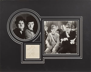 Lot #613  Laurel and Hardy - Image 1
