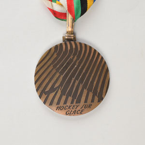 Lot #716 Grenoble 1968 Winter Olympics Ice Hockey Bronze Winners Medal with Ribbon & Box - Image 1
