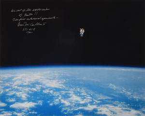 Lot #8497  STS-41-B: Bruce McCandless Oversized Signed Photograph - Image 1
