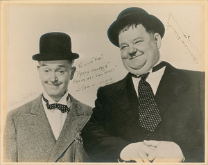 Lot #706  Laurel and Hardy - Image 1