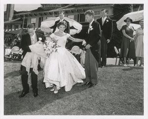 Lot #9179 John and Jacqueline Kennedy 1953 Wedding Photograph Sliding Down Hill - Image 1