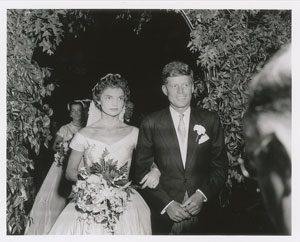 Lot #9174 John and Jacqueline Kennedy 1953 Wedding Photograph Exiting Church - Image 1