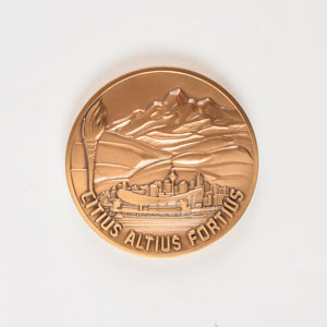 Lot #3165  Calgary 1988 Winter Olympics Bronze Participation Medal - Image 1