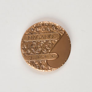 Lot #3182  Nagano 1998 Winter Olympics Bronze Participation Medal - Image 1