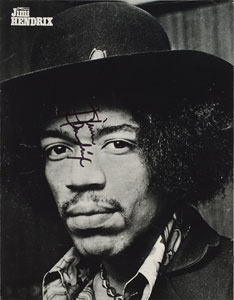 Lot #4102 Jimi Hendrix Experience Signed Magazine Photographs - Image 1