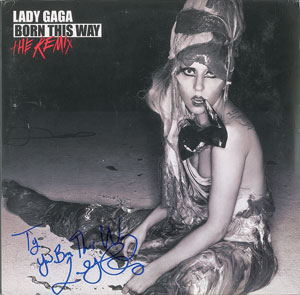 Lot #2493  Lady Gaga Signed Album - Image 1