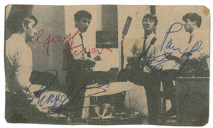 Lot #2009  Beatles 1963 Signed Newpaper Photo