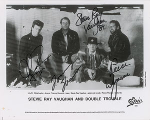 Lot #2455 Stevie Ray Vaughan and Double Trouble Signed Photograph - Image 1