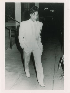 Lot #6130  Prince Original Photograph Walking in White Suit