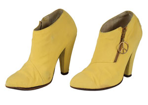 Lot #6131  Prince's Personally-Owned and Stage-Worn Yellow Boots - Image 1