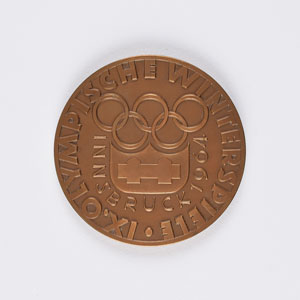 Lot #3080  Innsbruck 1964 Winter Olympics Bronze Participation Medal - Image 1