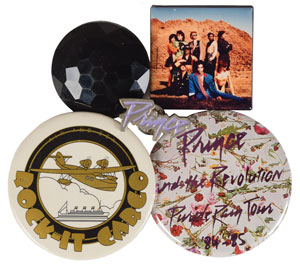 Lot #4121  Prince Wardrobe Pins, Button, and VHS Tape - Image 1