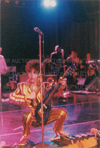 Lot #4188  Prince Group of (3) Unpublished 1993 Paisley Park KMOJ Benefit Show Photographs and (1) Slide - Image 1