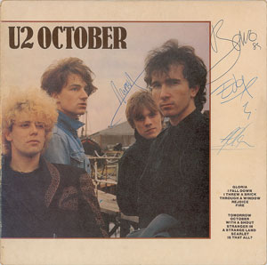 Lot #5236  U2 Signed Album