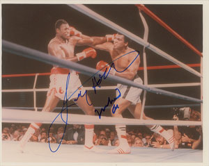 Lot #1000 Muhammad Ali and Larry Holmes