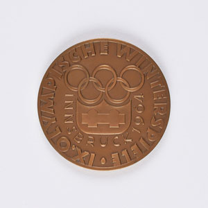 Lot #9583  Innsbruck 1964 Winter Olympics Bronze Participation Medal - Image 1