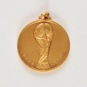 Lot #9412  1982 FIFA World Cup Gold Winner's Medal - Image 1