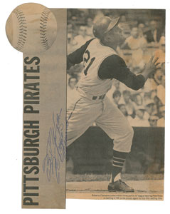 Lot #9246 Roberto Clemente Signed Newspaper Photograph - Image 1