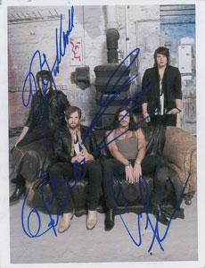 Lot #2821  Kings of Leon Signed Photograph - Image 1