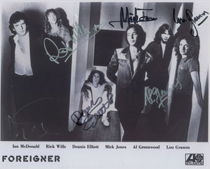 Lot #2657  Foreigner Signed Photograph