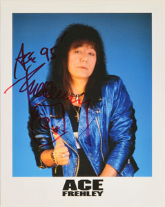 Lot #2443  KISS: Ace Frehley Signed Poster and Photograph - Image 1