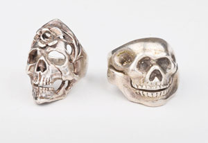 Lot #2557 CJ Ramone's Pair of Skull Rings Given by