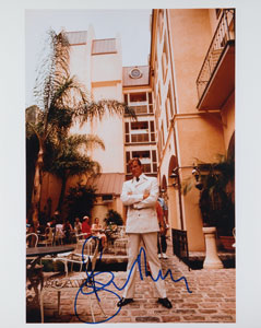 Lot #979 Roger Moore - Image 1