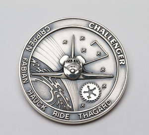 Lot #4638  STS-7 Unflown Robbins Medal
