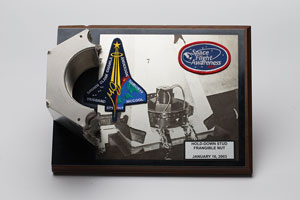 Lot #4662  STS-107 Frangible Nut Plaque - Image 1