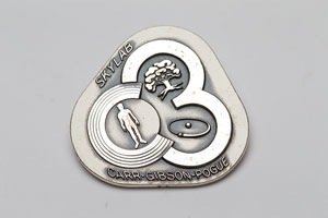 Lot #4602 Ed Gibson's Skylab 4 Unflown Robbins Medal - Image 1