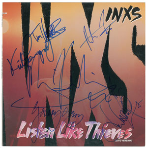 Lot #5577  INXS Signed Album - Image 1