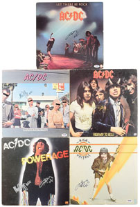 Lot #633  AC/DC: Angus and Malcolm Young - Image 1