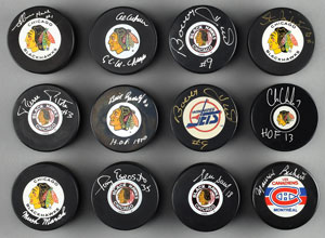 Lot #8476  Chicago Black Hawks Signed Puck Collection (10) with Bobby Hull - Image 1