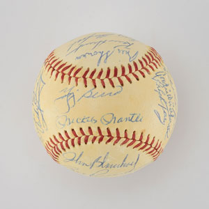 Lot #8254  1959 New York Yankees Team Signed Baseball with Mantle and Berra - Image 1