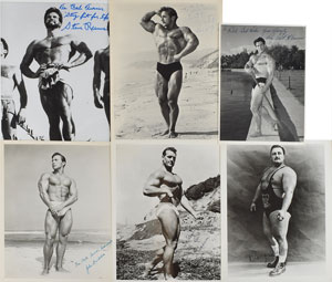 Lot #823  Bodybuilders and Weightlifters - Image 1