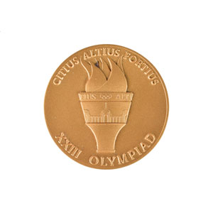Lot #3107  Los Angeles 1984 Summer Olympics Bronze Participation Medal with Case and Volunteer Medal - Image 2