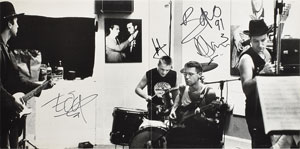 Lot #4670  U2 Signed Album - Image 2