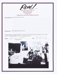 Lot #4670  U2 Signed Album - Image 4