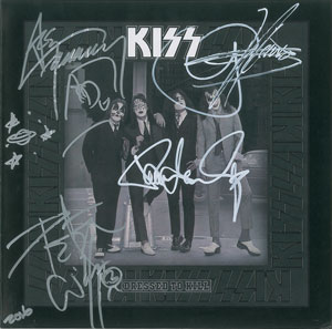 Lot #4508  KISS Signed Album - Image 1