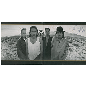 Lot #4672  U2 Signed Album - Image 2