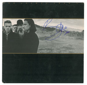Lot #4707  U2: Bono Signed Album - Image 1