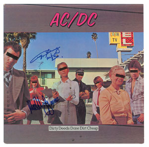 Lot #4540  AC/DC: Angus and Malcolm Young Signed