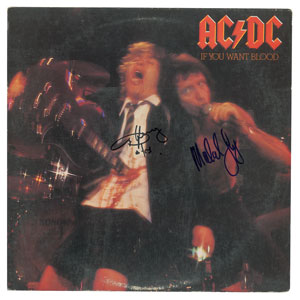 Lot #4540  AC/DC: Angus and Malcolm Young Signed Albums - Image 2
