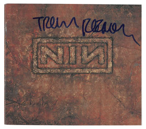 Lot #4757 Trent Reznor Signed CDs and Insert - Image 1