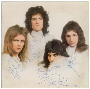 Lot #4524  Queen Signed Album