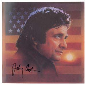 Lot #4196 Johnny Cash Signed Flag Photo