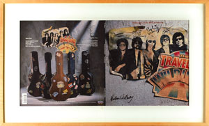 Lot #4667  Traveling Wilburys Signed Album Cover Proof - Image 1