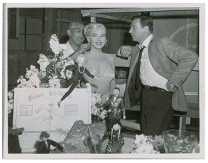 Lot #695 Marilyn Monroe, George Cukor, and Yves Montand - Image 1