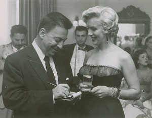 Lot #569 Marilyn Monroe and Earl Wilson