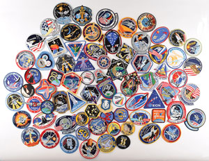 Lot #5402  Space Program Patches and Shuttle Insulation Collection - Image 1